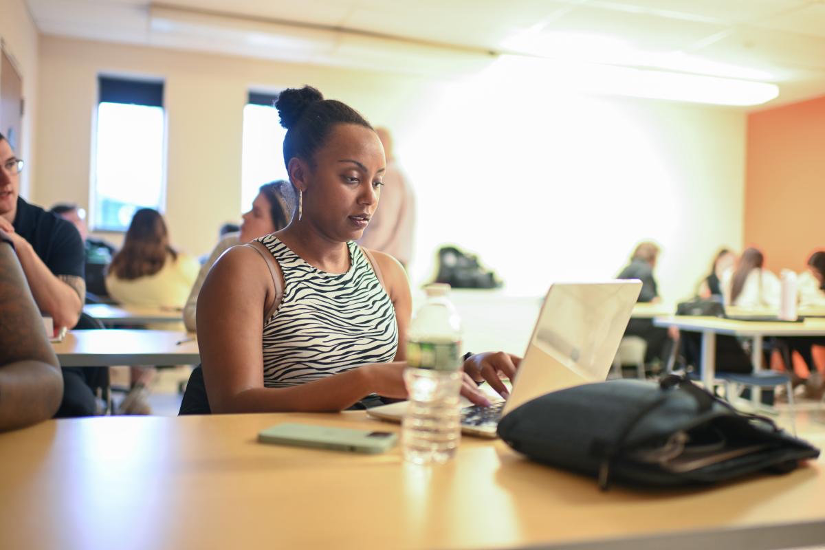 Counseling student on computer