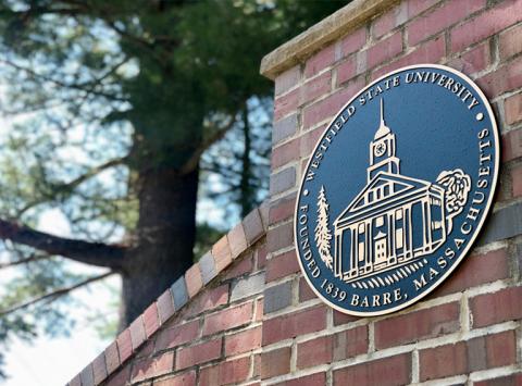 The Westfield State University Seal on the main campus gate