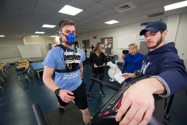 A Westfield State student on the treadmill